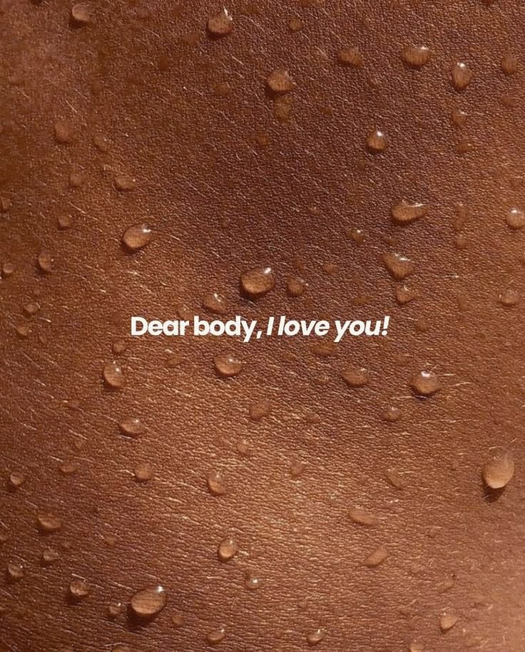 Water droplets on skin with the words Dear body, I love you